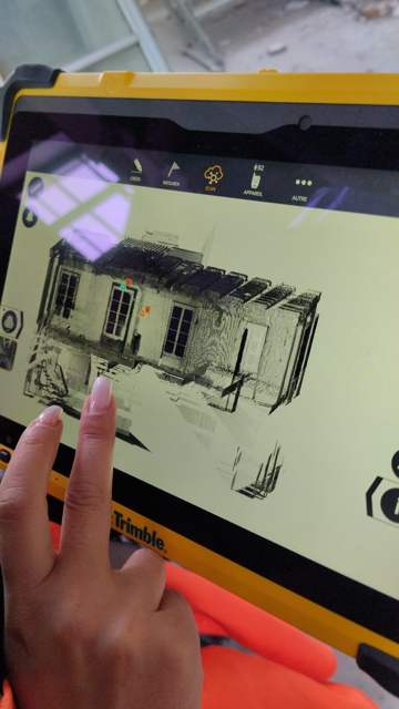 Tablette de pilotage du scanner 3D affichant un nuage de points